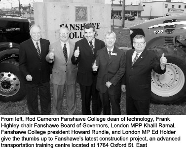 From left, Rod Cameron Fanshawe College dean of technology, Frank Highley chair Fanshawe Board of Governors, London MPP Khalil Ramal, Fanshawe College president Howard Rundle, and London MP Ed Holder give the thumbs up to Fanshawe's latest construction project, an advanced transportation training centre located at 1764 Oxford St. East